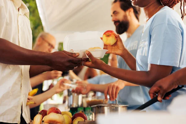 Food donation handover at a township kitchen